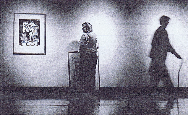 A photo of Elizabeth installing a Picasso